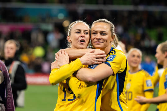 Amanda Ilestedt and Fridolina Rolfö of Sweden celebrate