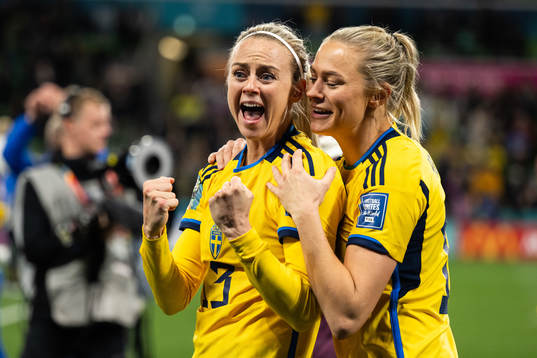 Amanda Ilestedt and Fridolina Rolfö of Sweden celebrate