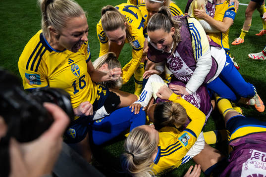Players of Sweden celebrate