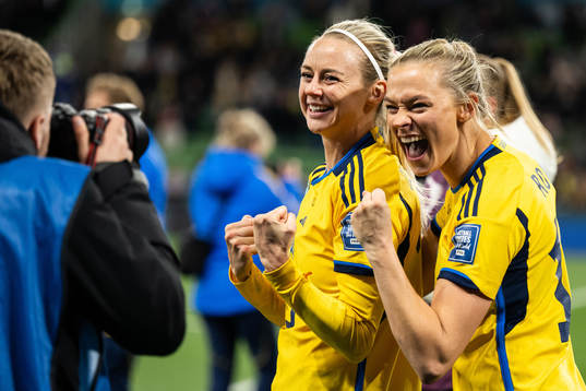 Amanda Ilestedt and Fridolina Rolfö of Sweden celebrate