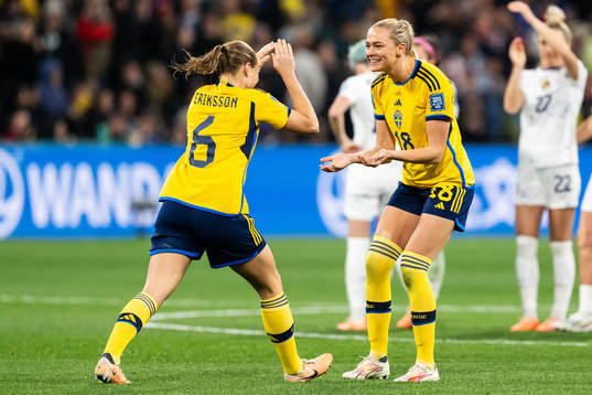 Magdalena Eriksson and Fridolina Rolfö of Sweden celebrate