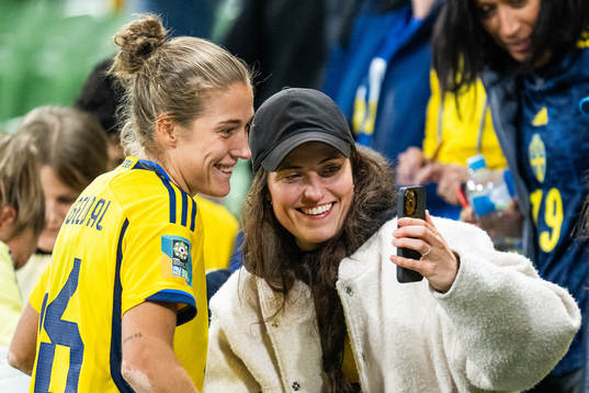 Filippa Angeldahl of Sweden looks at a phone
