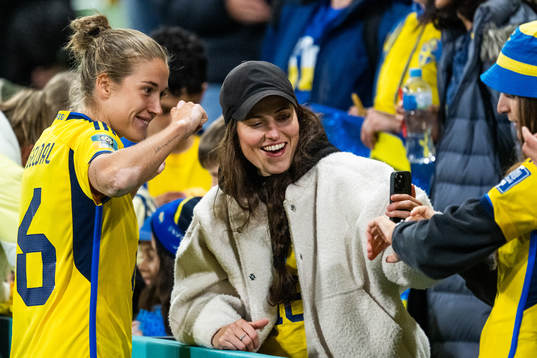 Filippa Angeldahl of Sweden looks at a phone