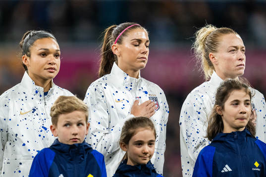Sophia Smith, Alex Morgan and Emily Sonnett of USA