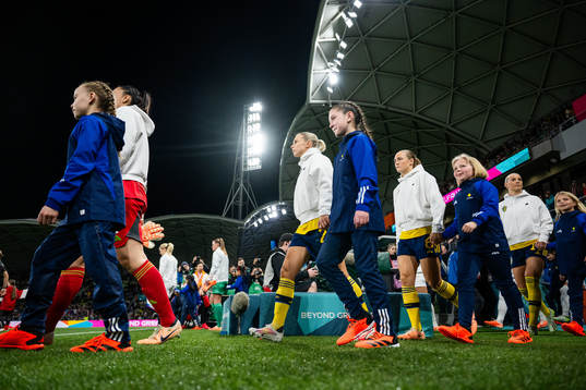 Jonna Andersson and Magdalena Eriksson of Sweden enter the
