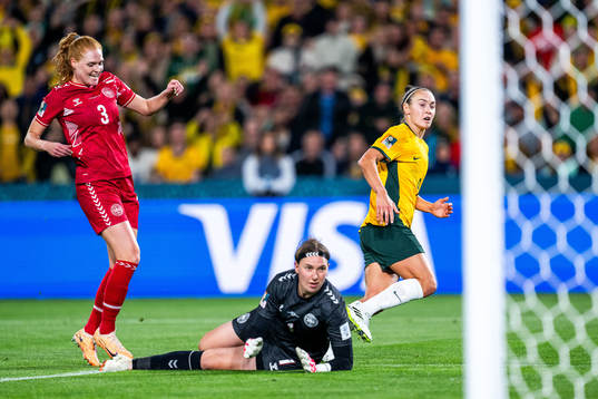 Stine Ballisager and goalkeeper Lene Christensen of Denmark