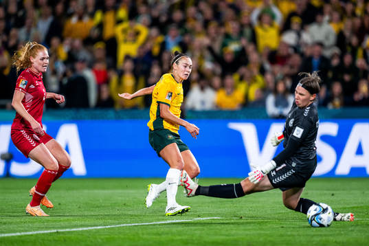Stine Ballisager and goalkeeper Lene Christensen of Denmark