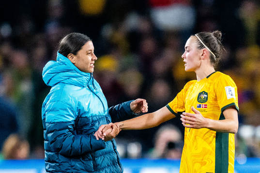 Sam Kerr and Caitlin Foord of Australia celebrate