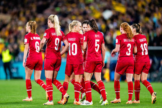 Pernille Harder of Denmark with team looks dejected