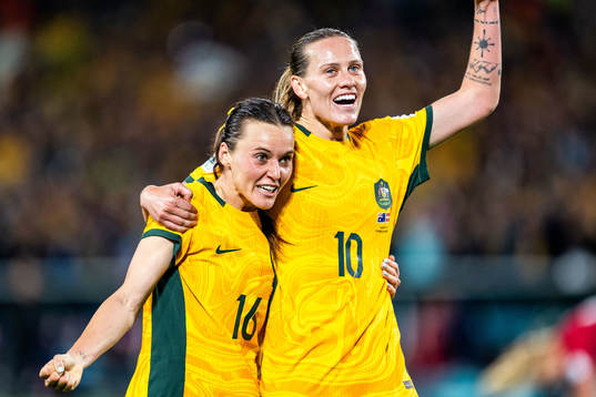 Hayley Raso and Emily van Egmond of Australia celebrates