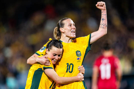 Hayley Raso and Emily van Egmond of Australia celebrates