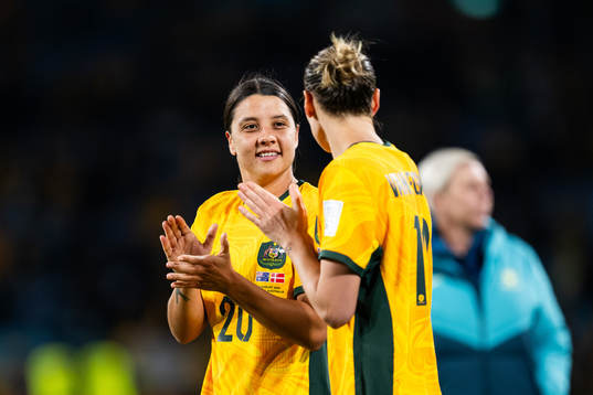 Sam Kerr and Emily van Egmond of Australia