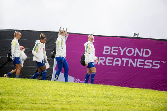 Players of Sweden arrive at a training session