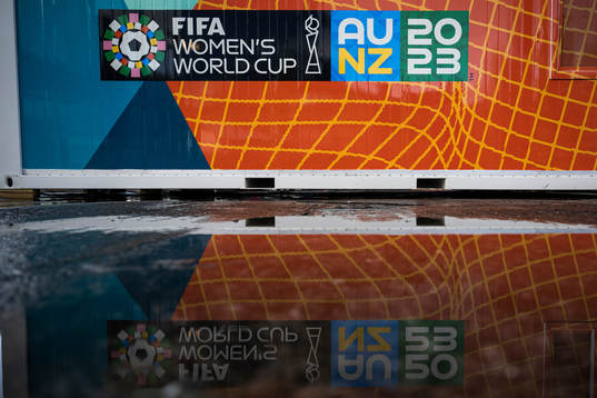 The logo for the FIFA Women's World Cup is reflected in