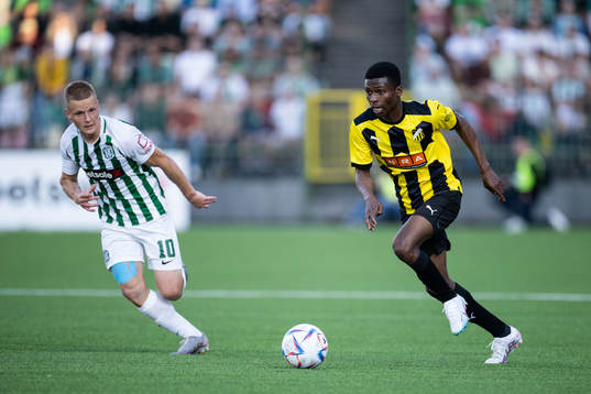 Paulius Golubickas of Zalgiris Vilnius and Akoua Romeo