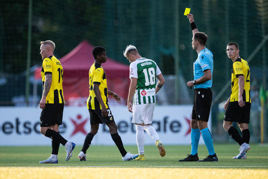 Akoua Romeo Amane of Häcken receives a yellow card from