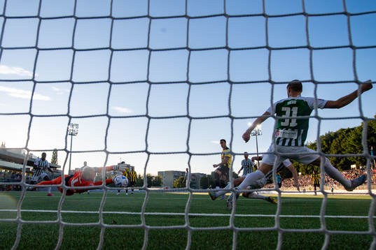 Srdjan Hrstic of Häcken scores 0-2 behind goalkeeper