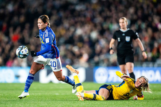 Fuka Nagano of Japan and Kosovare Asllani of Sweden