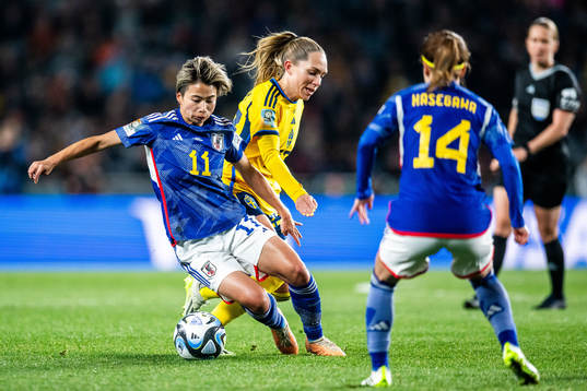 Mina Tanaka of Japan and Elin Rubensson of Sweden