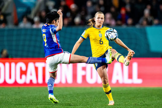 Riko Ueki of Japan and Magdalena Eriksson of Sweden