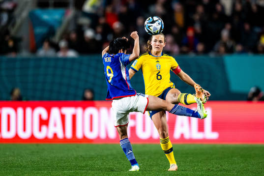 Riko Ueki of Japan and Magdalena Eriksson of Sweden