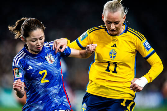 Risa Shimizu of Japan and Stina Blackstenius of Sweden
