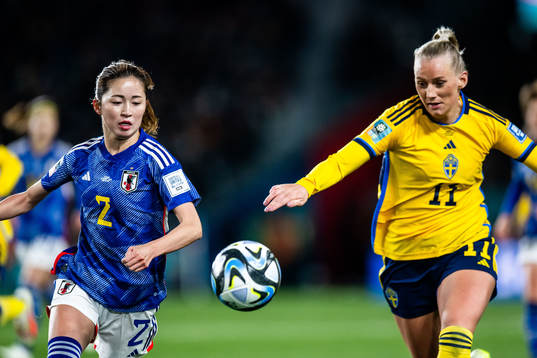 Risa Shimizu of Japan and Stina Blackstenius of Sweden