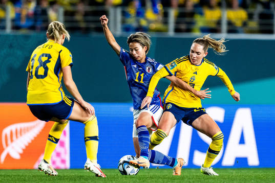Mina Tanaka of Japan and Elin Rubensson of Sweden