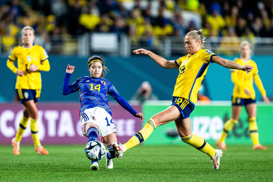 Yui Hasegawa of Japan and Fridolina Rolfö of Sweden