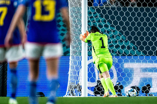 goalkeeper Zecira Musovic of Sweden stretching