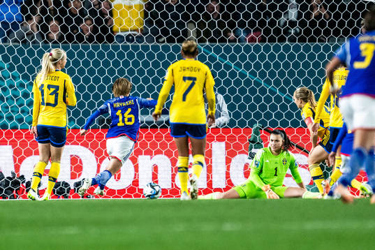 Honoka Hayashi of Japan celebrates and goalkeeper Zecira