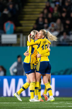 Amanda Ilestedt and Sofia Jakobsson of Sweden celebrate