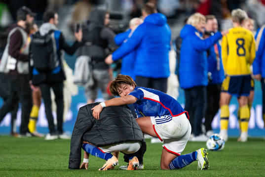 Hana Takahashi of Japan consoles a team mate