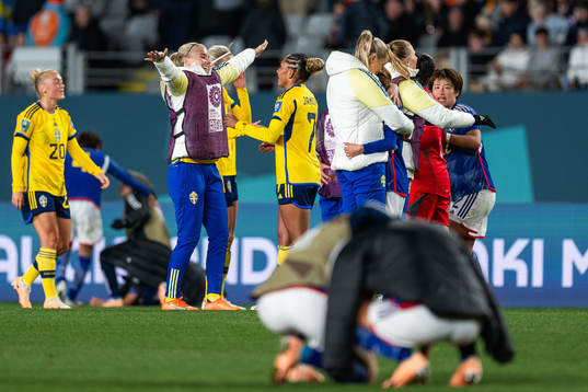 Stina Lennartsson and Madelen Janogy of Sweden celebrate
