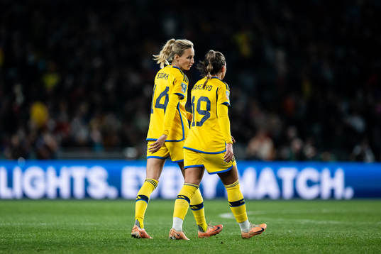 Nathalie Björn and Johanna Rytting Kaneryd of Sweden leave