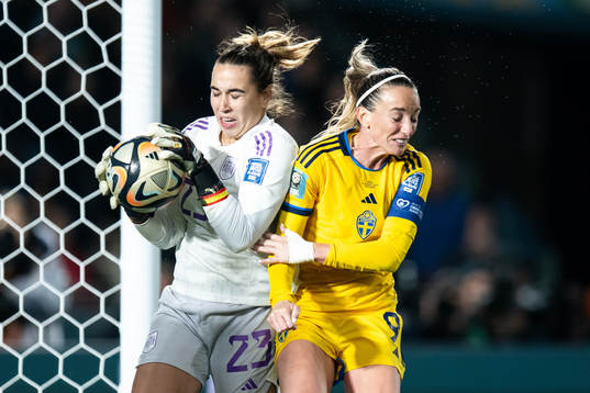 goalkeeper Cata Coll of Spain and Kosovare Asllani of Sweden