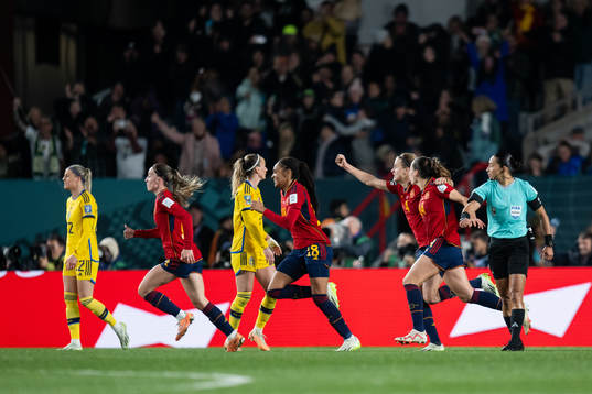 Players of Spain celebrate