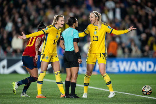 Nathalie Björn and Amanda Ilestedt of Sweden reacts