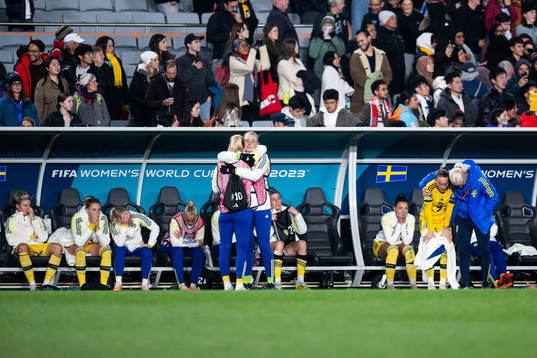 Players of Sweden look dejected