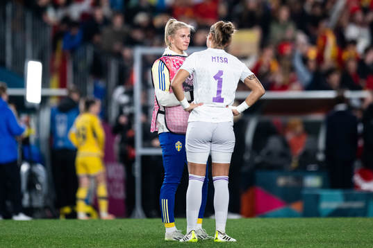 Sofia Jakobsson of Sweden and goalkeeper Misa Rodriguez of