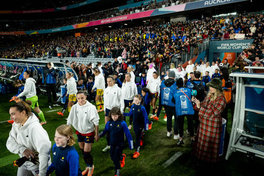 Players enter the pitch