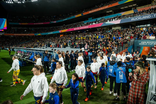 Players enter the pitch