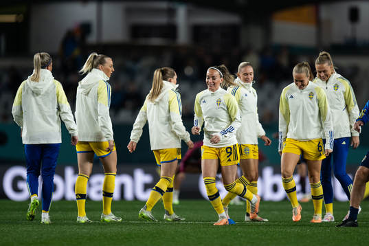 Kosovare Asllani and Magdalena Eriksson of Sweden