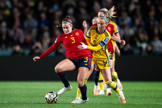 Teresa Abelleira of Spain and Kosovare Asllani of Sweden