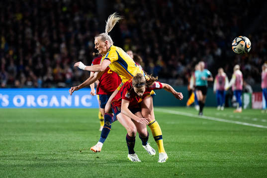 Stina Blackstenius of Sweden and Irene Paredes of Spain