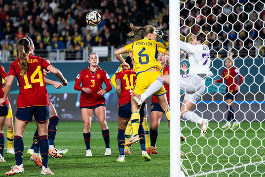 Magdalena Eriksson of Sweden and goalkeeper Cata Coll of