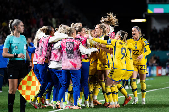 Rebecka Blomqvist of Sweden celebrates with  team mates