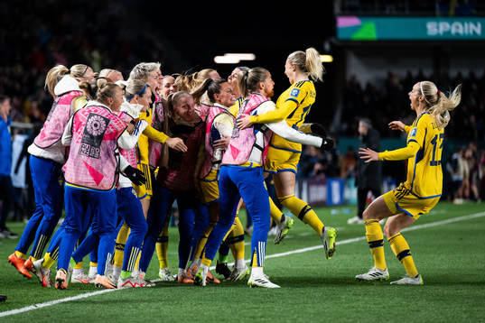 Rebecka Blomqvist of Sweden celebrates with  team mates
