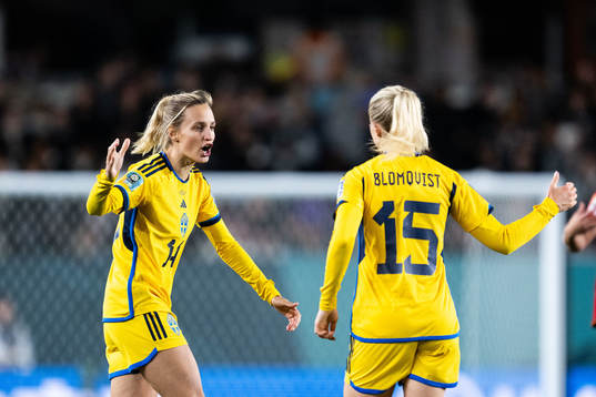 Rebecka Blomqvist of Sweden celebrates with  Nathalie Björn