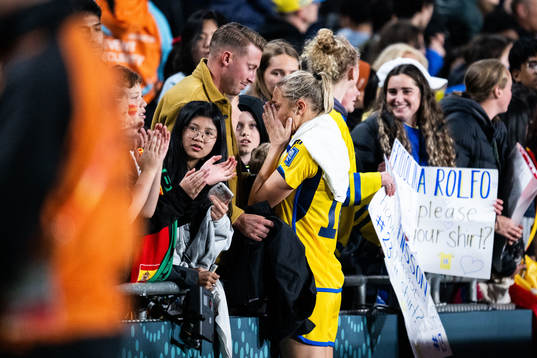 Fridolina Rolfö of Sweden looks dejected with boyfriend